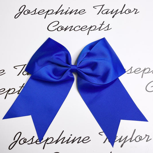 Large bright blue girls hair bow